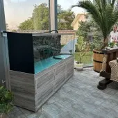 Custom aquarium with crocodile cabinet